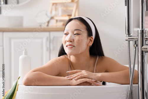 Beautiful young happy Asian...
