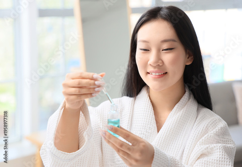 Beautiful young happy Asian...