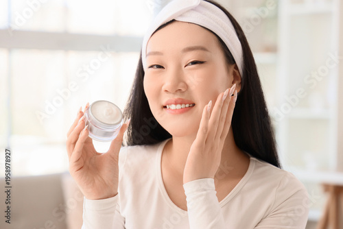 Beautiful young happy Asian...