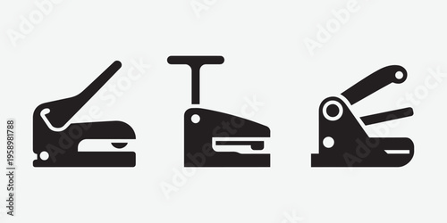 Silhouette of three hole punchers in a row office supplies