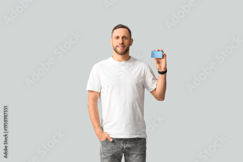 Stylish young man in jeans ...