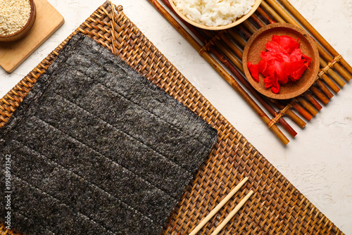 Wicker mat with nori sheets...