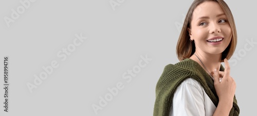 Beautiful young woman with ...