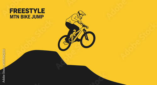 Dynamic Freestyle Mountain Biker Ascending High During Aerial Jump Stunt