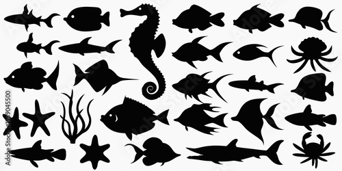 Silhouettes of various marine life including fish seahorses and crustaceans
