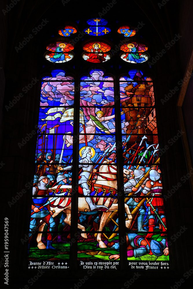 Obraz premium Joan of Arc stained glass window in the Saint-Etienne Cathedral of Auxerre in Burgundy, France