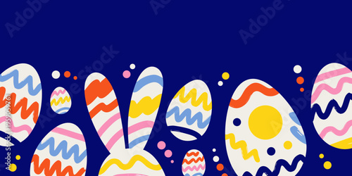 Close-up view of decorative Easter eggs displaying bright wavy lines and dots stands partially visible next to a subtle bunny silhouette on dark blue.
