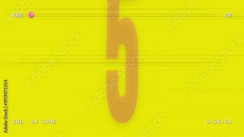 Retro VHSstyle colorful countdown timer with purple numbers on a yellow background
