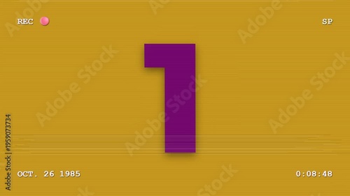Retro VHS style colorful countdown timer with vintage date and timecode overlays