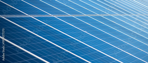 Solar energy panel with blue closeup texture. Solar renewable electric system detail. Solar cells with pattern and lines. Solar clean modern background with perspective.