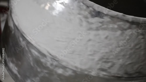 Rotating Cement Mixer Drum Close-Up – Concrete Mixing Process and Machinery Detail