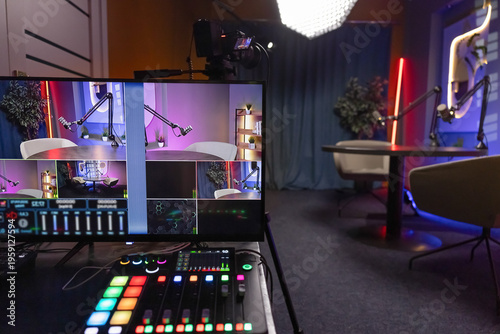 Obraz na plátně Professional podcast studio prepared for recording talk show or interview, closeup view control monitor displays multiple camera angles