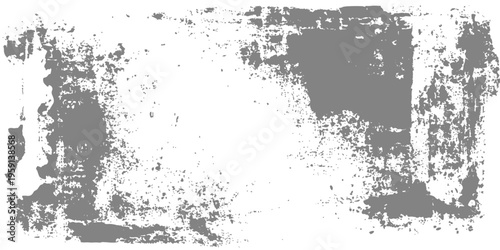 Abstract a textured grunge background with the appearance of weathered or aged material. The composition is monochromatic and features a blend of gray tones that add depth and visual intrigue.