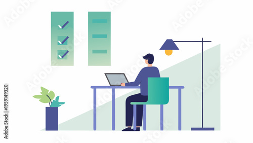 A man works on his laptop at a desk in a modern office