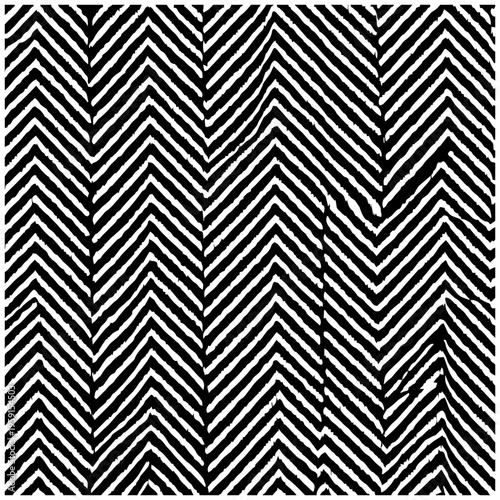 Black and white v shaped herringbone pattern background texture with geometric chevron design