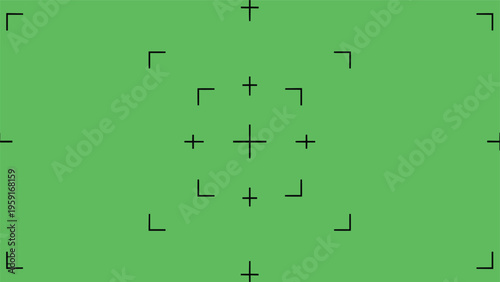 Professional video production camera viewfinder overlay with focus markings and crosshairs on a solid green screen background.