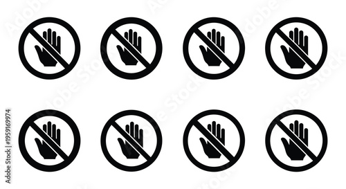 Multiple prohibition signs featuring a black hand with a red circle and slash