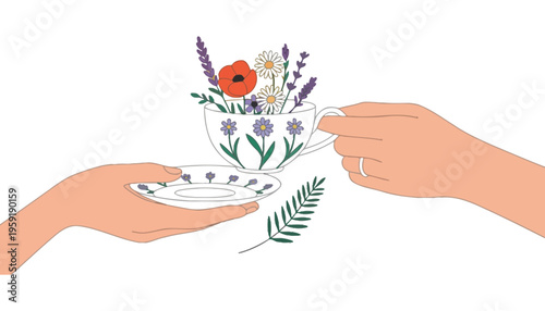 A tea cup with flowers being held by two hands