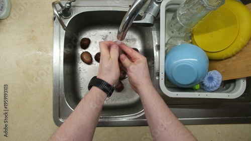 Washing Dishes in Kitchen Sink