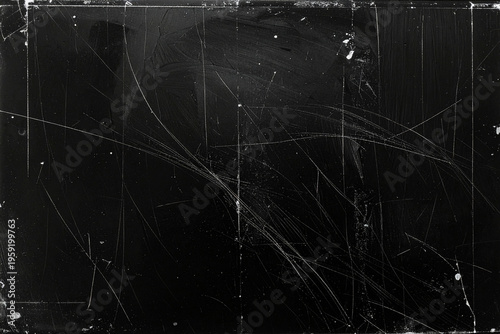 A high-clarity black surface with dust, scratches, and noise effect background