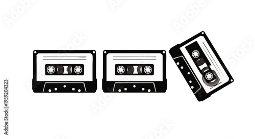 Set of three classic analog audio cassette tapes in black and white isolated on a clean white background for retro