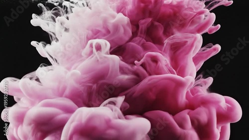 Abstract colorful ink clouds swirling in dark water