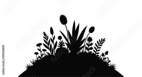 Silhouette of diverse plants and flowers growing on a mound