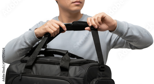Man holding black travel bag with two handles