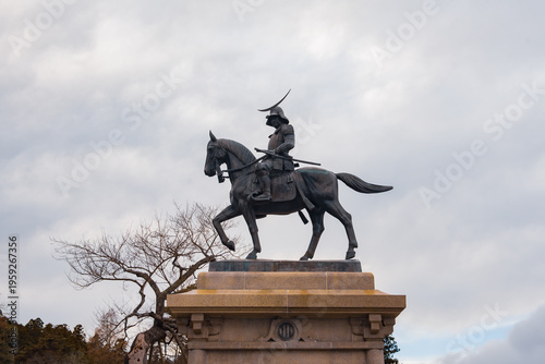 Equestrian statue of Date Masamune overlooking the city at the historic Aoba Castle Ruins (Sendai Castle) in Sendai, Japan.