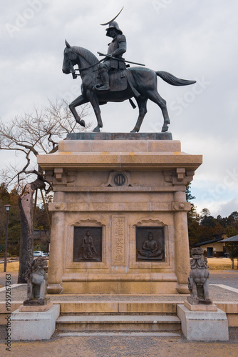 Equestrian statue of Date Masamune overlooking the city at the historic Aoba Castle Ruins (Sendai Castle) in Sendai, Japan.