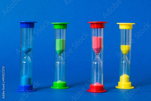 hourglass on the table, sand clock as time passing concept for business deadline, copy space