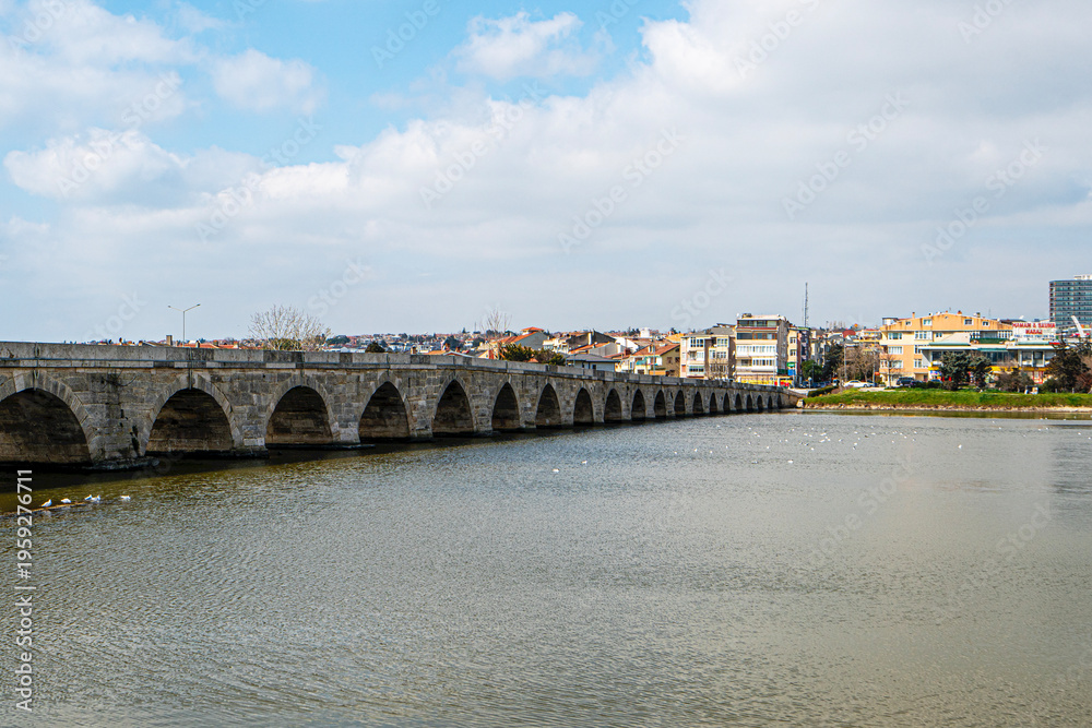 Fototapeta premium The scenic views of the historical stone Mimar Sinan Bridge in Silivri, Turkey, were built by the well-known architect Mimar Sinan in the 16th century.