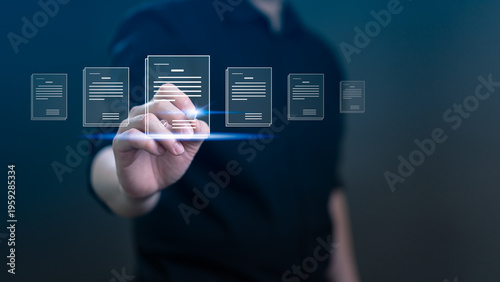 Businessman hand signing electronic document on virtual screen. Concept of digital signature, e-signing, paperless office, and online contract management with futuristic glowing interface.