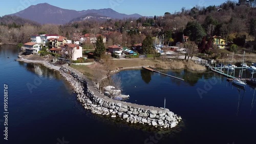 Wallpaper Mural Aerial view of Sasso Moro harbor and Leggiuno lakeside village on Lake Maggiore, province of Varese, Lombardy, Italy Torontodigital.ca
