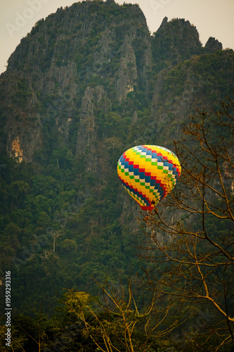 Colorful hot air balloon over Vang Vieng