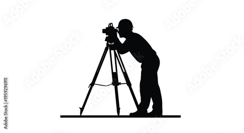 Surveyor using a theodolite and tripod in a black silhouette