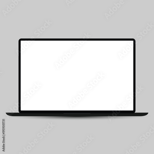 A sleek black laptop with a blank white screen on a gray background