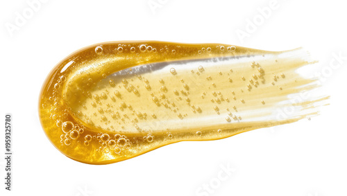 Viscous golden liquid smear with tiny air bubbles, beauty product cosmetic gel texture