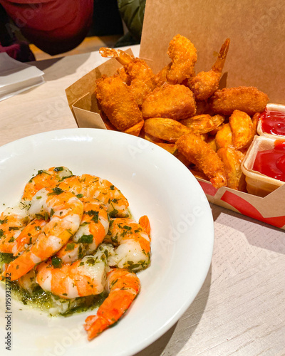  Seafood dishes, prawn and shrimp with pesto at the seafood franchise restaurant in Salzburg, Austria