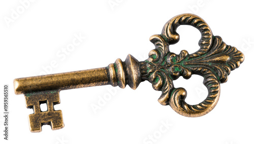 Fotografía Ornate antique brass skeleton key with rustic green patina isolated for historic