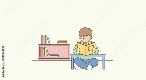 Young boy reading a book sitting.