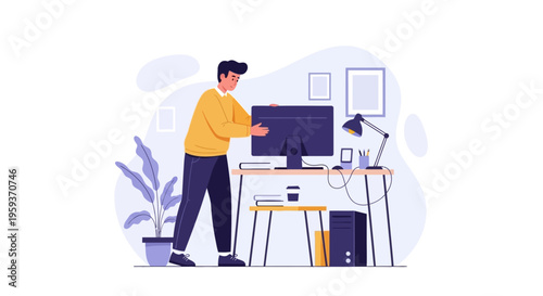 Man working on computer at office desk with chair and plant nearby