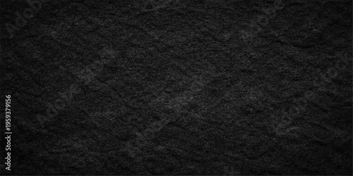 A dark black fabric texture background with a macro pattern of rough textile material provides a detailed cloth surface backdrop for a grey textured wallpaper design