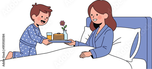 Smiling young boy in pajamas serves breakfast in bed on a tray to a happy woman resting in the bedroom.