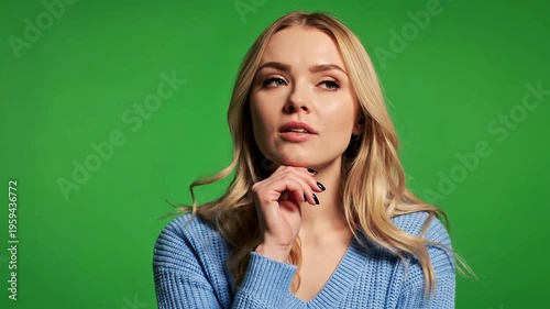 A young woman with a thoughtful expression.