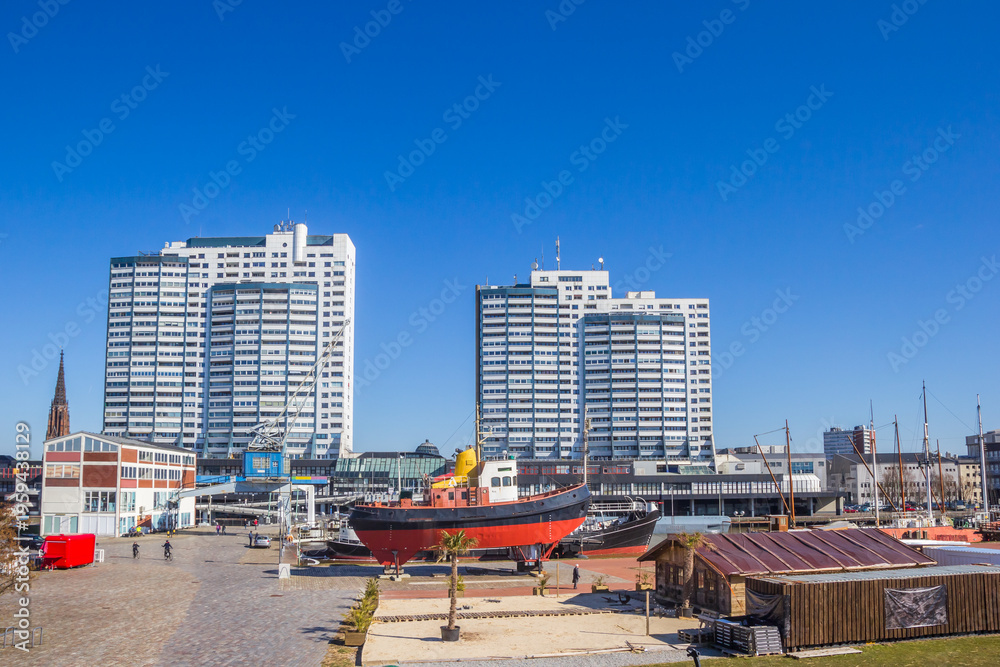 Obraz premium Apartment buildings at the Museumshafen in Bremerhaven, Germany