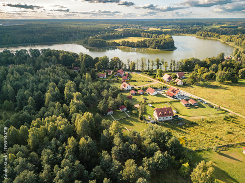 Aerial view of Lake Wejsunek and village of Wejsuny in Masuria, Warmian-Masurian Voivodeship, Poland