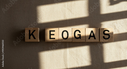 top view of wooden blocks with design lettering on beige background