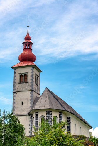 Saint Andrew Church tower with red dome in Bled, Slovenia