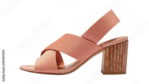 Stylish peach slingback sandal with criss-cross straps and elegant wooden block heel